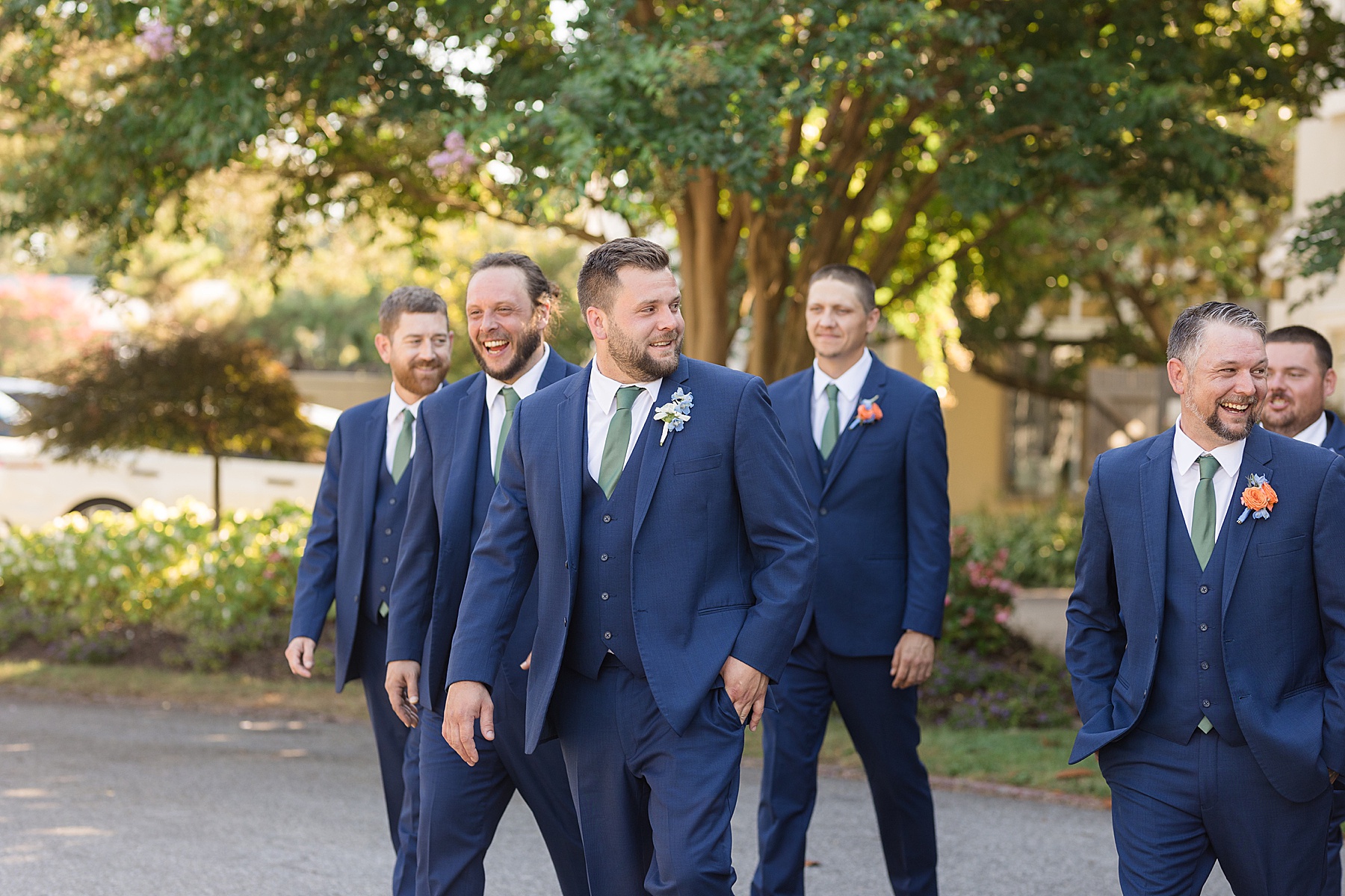 groom and groomsmen walking