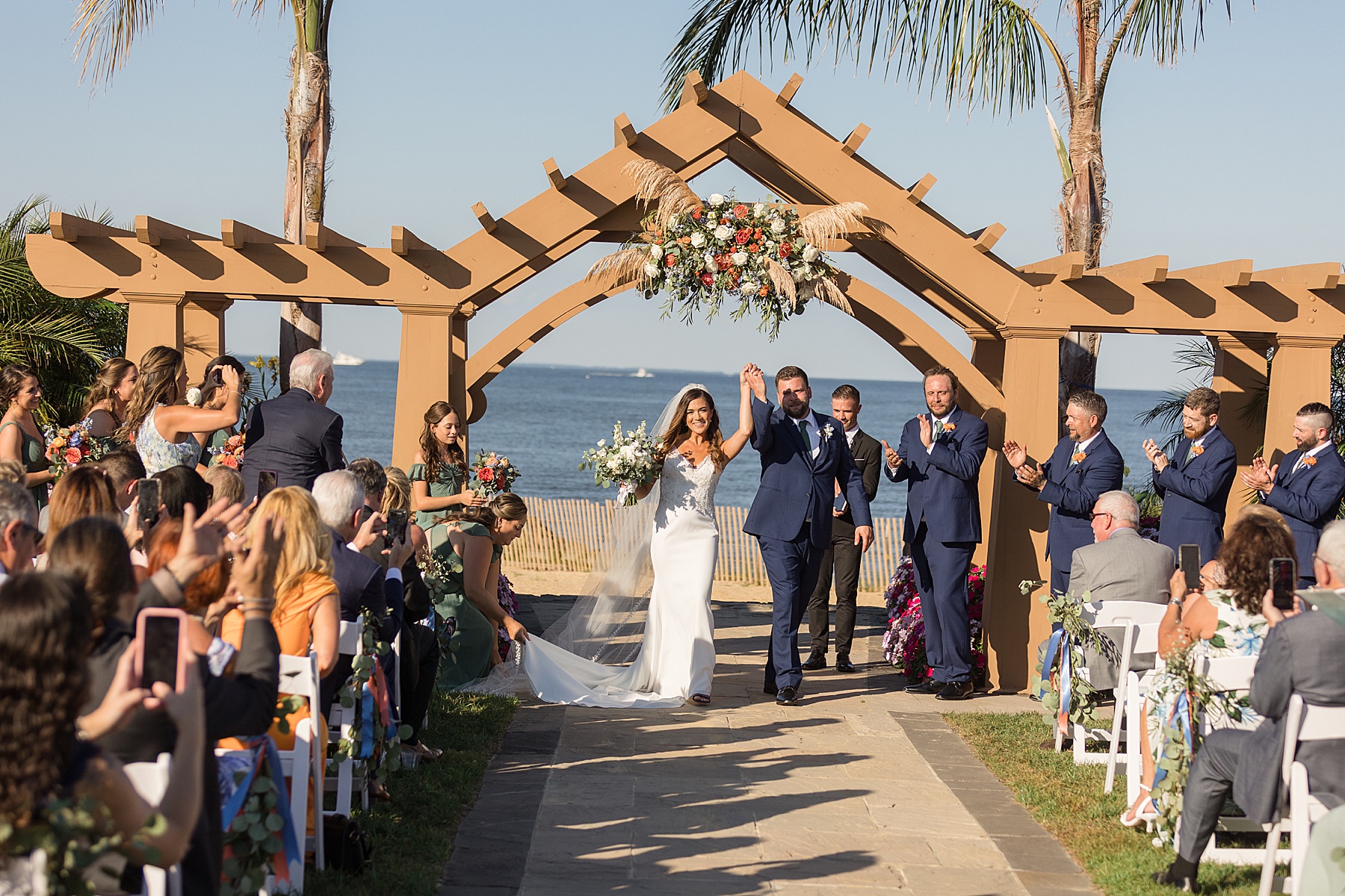 herrington on the bay coastal ceremony palm tree