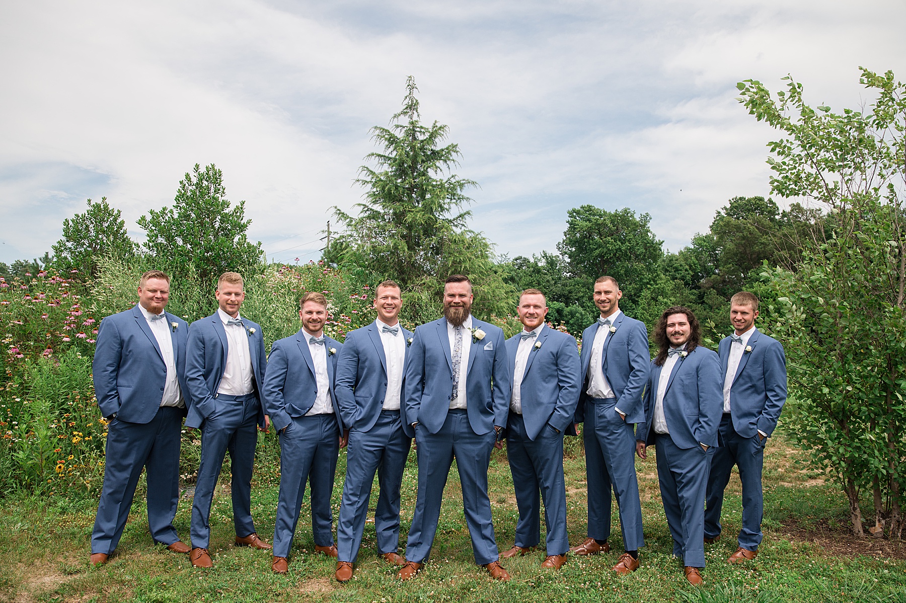 groom and groomsmen portrait navy suits