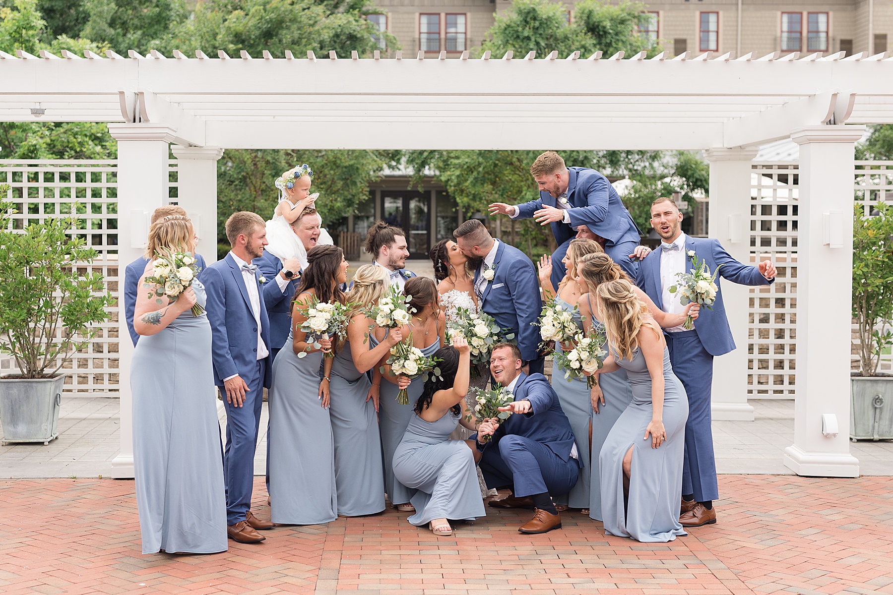 full wedding party under courtyard arbor chesapeake bay beach club inn funny