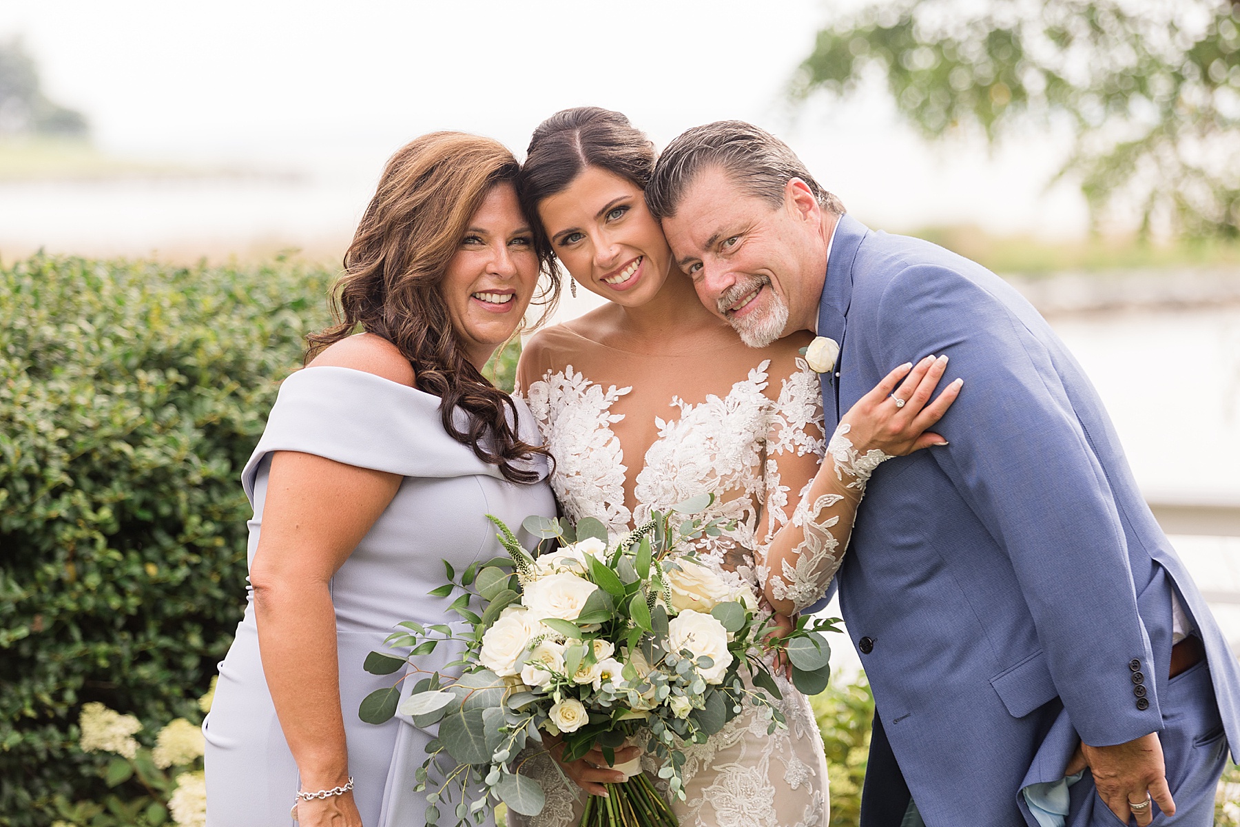 bride with her parents