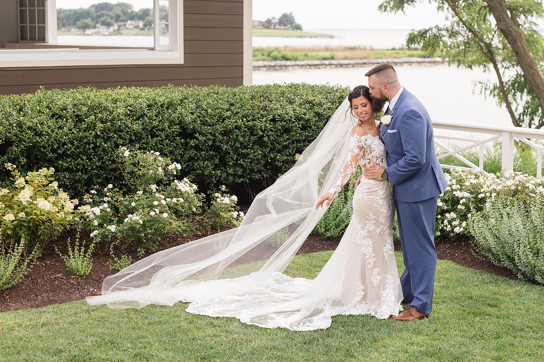 bride and groom veil portrait