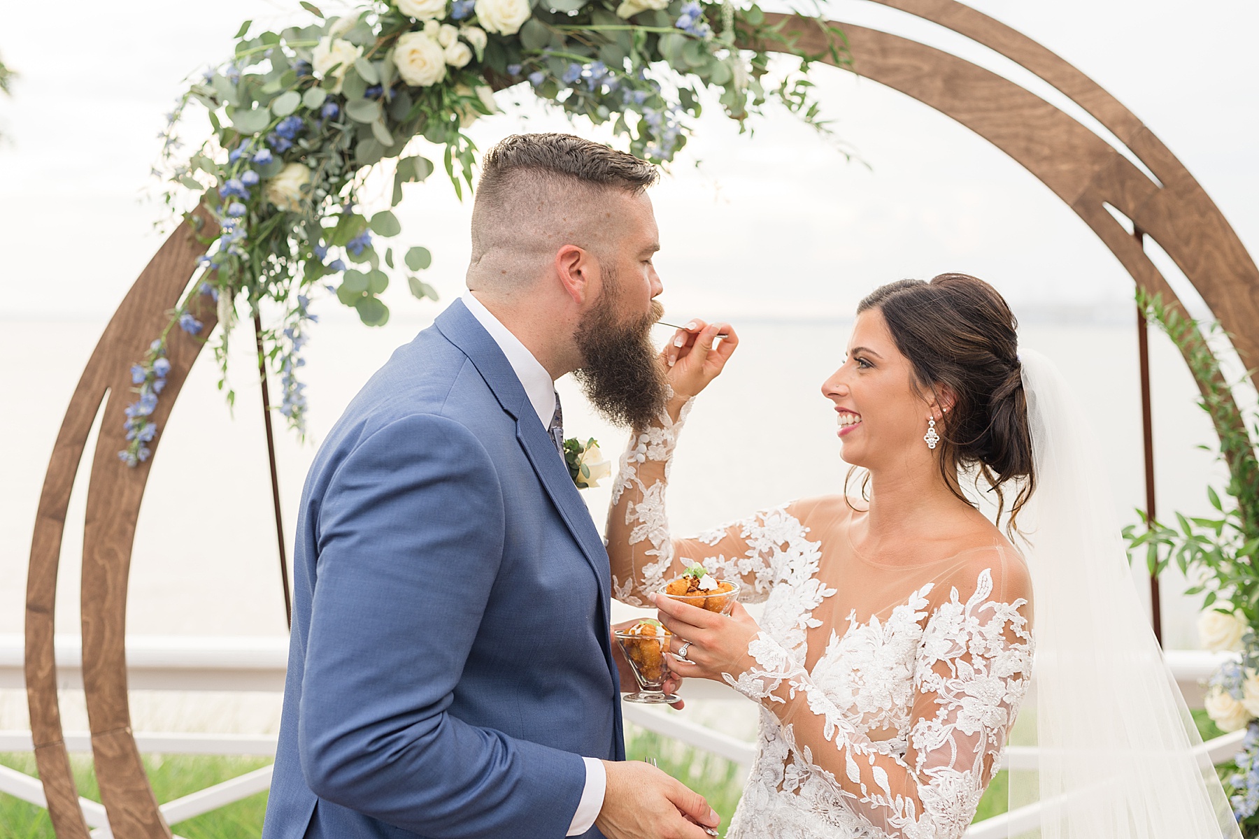 bride feeds groom tater tots