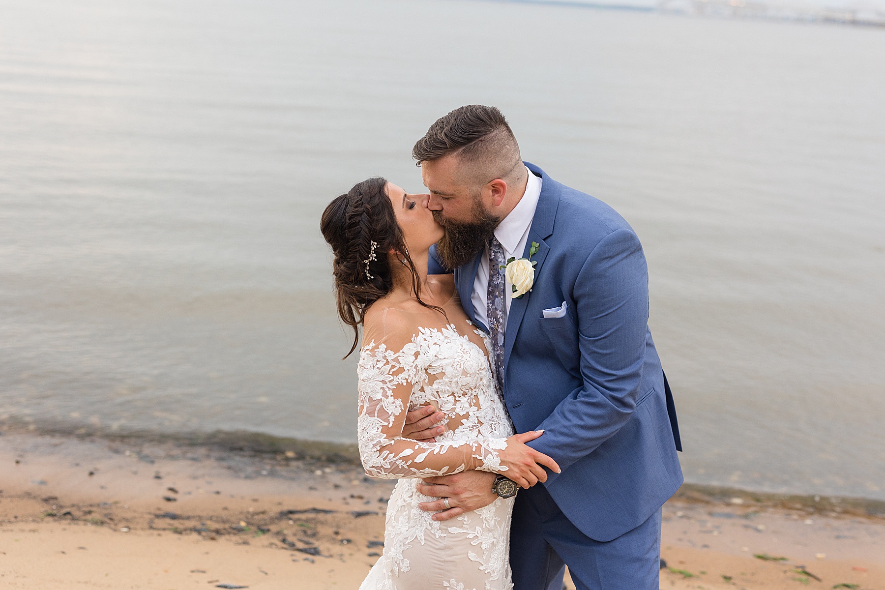 couple kissing on beach