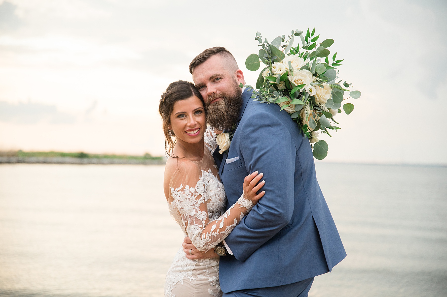 bride and groom portrait on beach