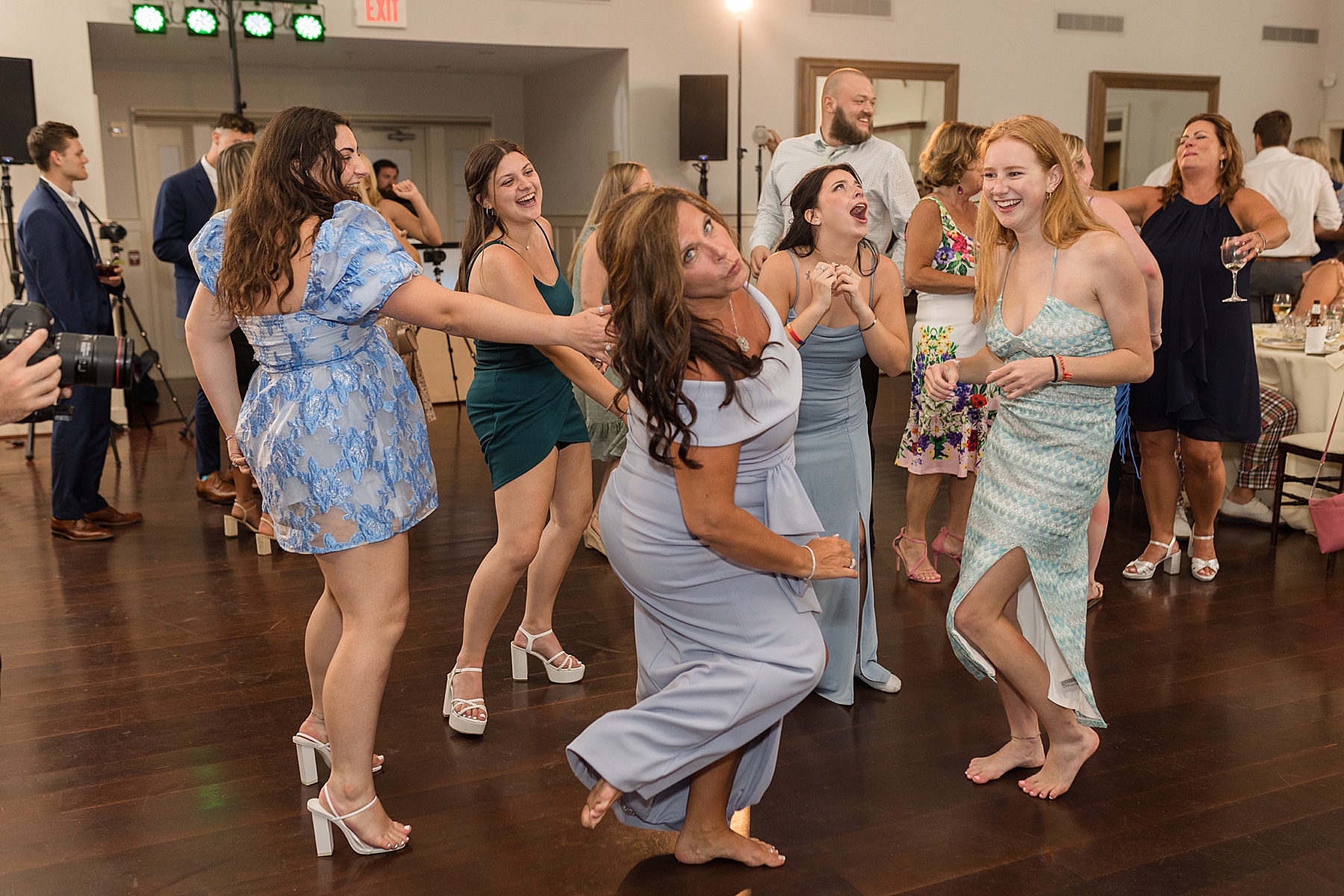 candid guests dancing reception