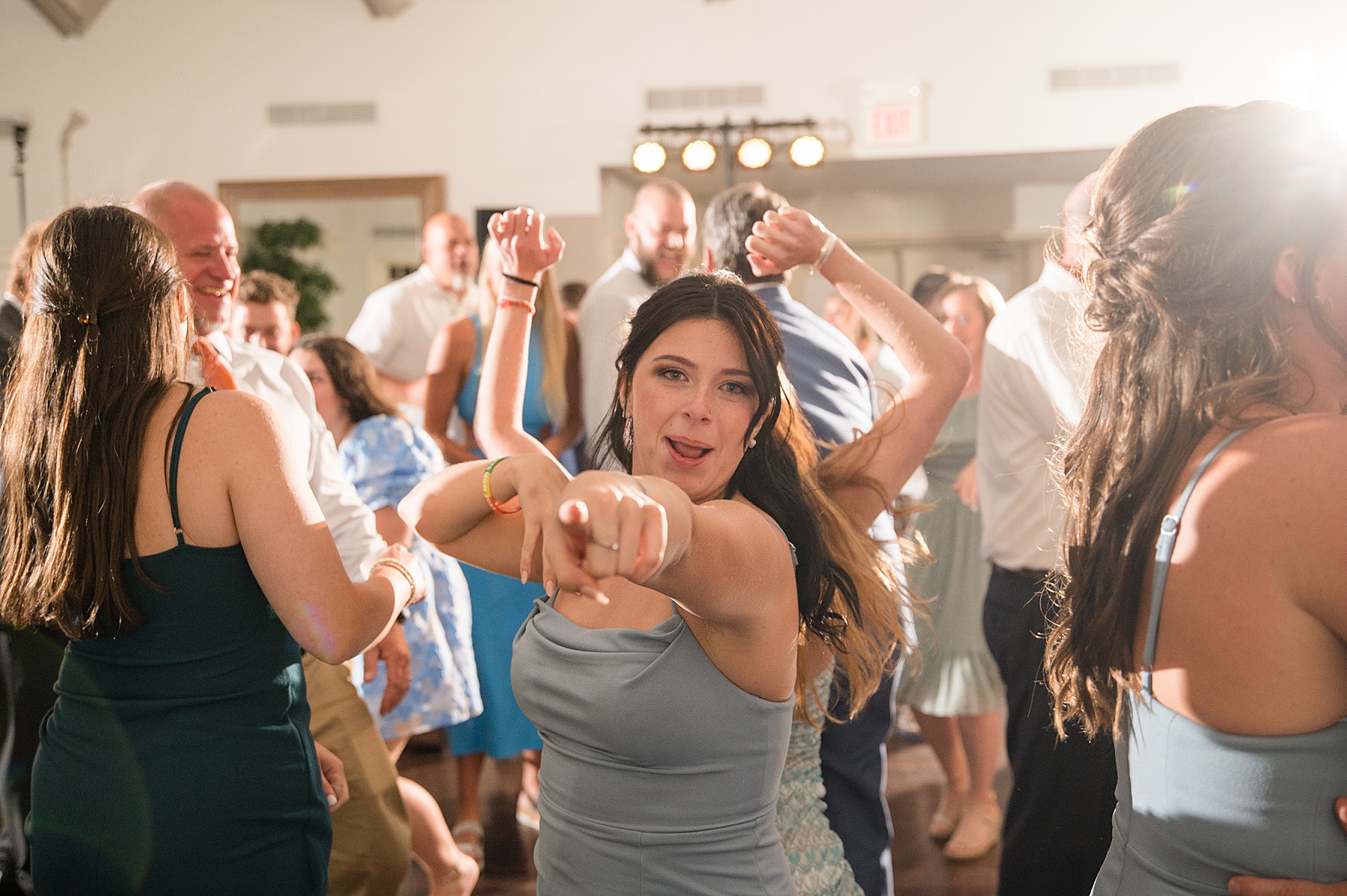 candid guests dancing reception