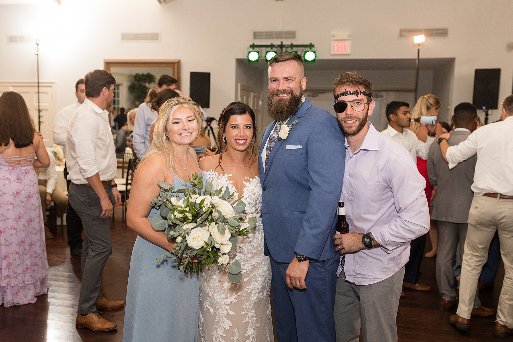 candid guests dancing reception