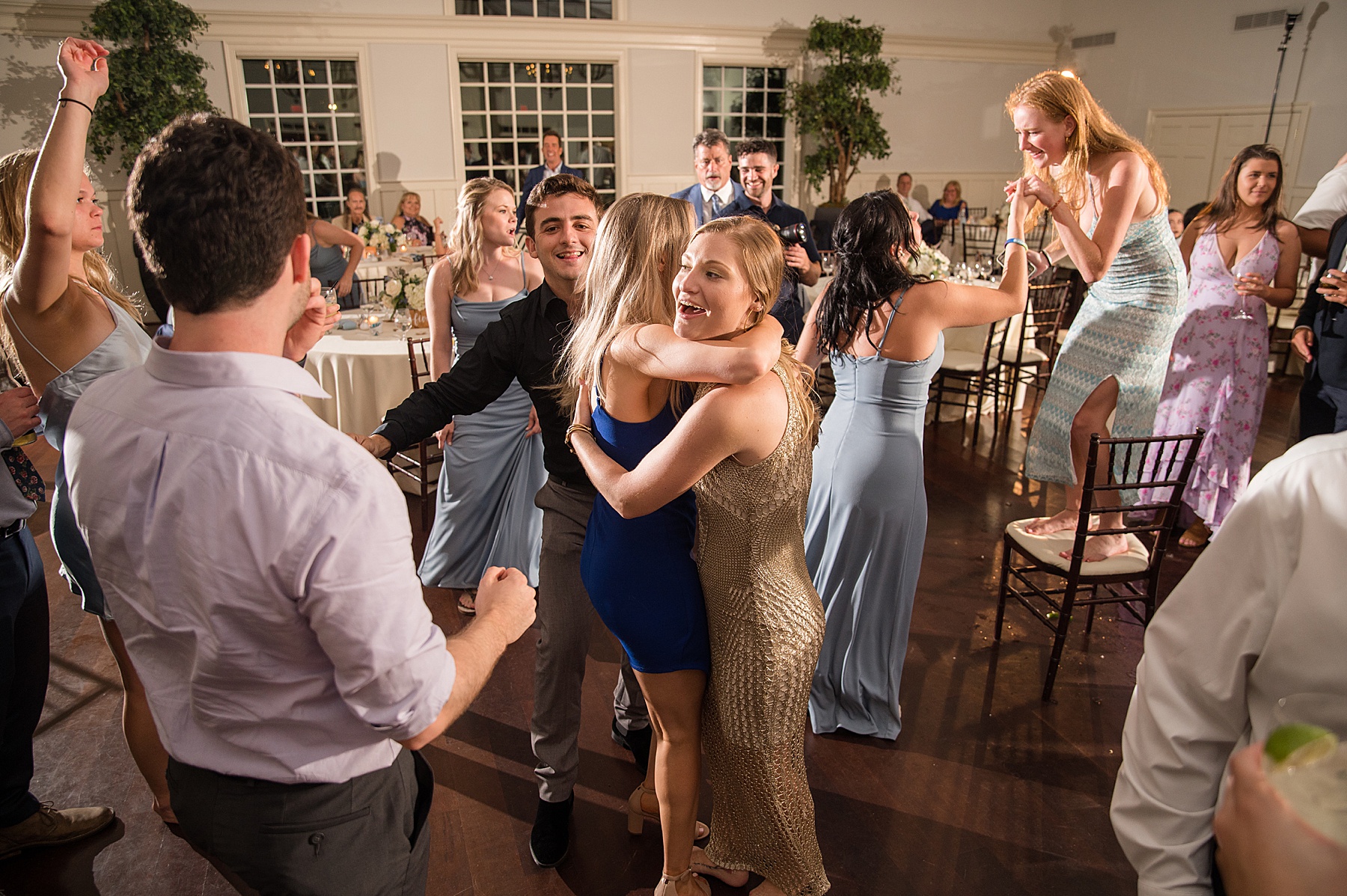 candid guests dancing reception