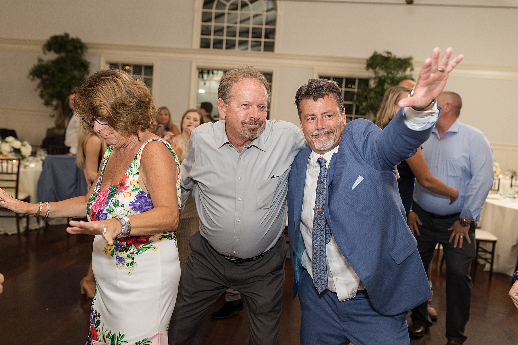 candid guests dancing reception