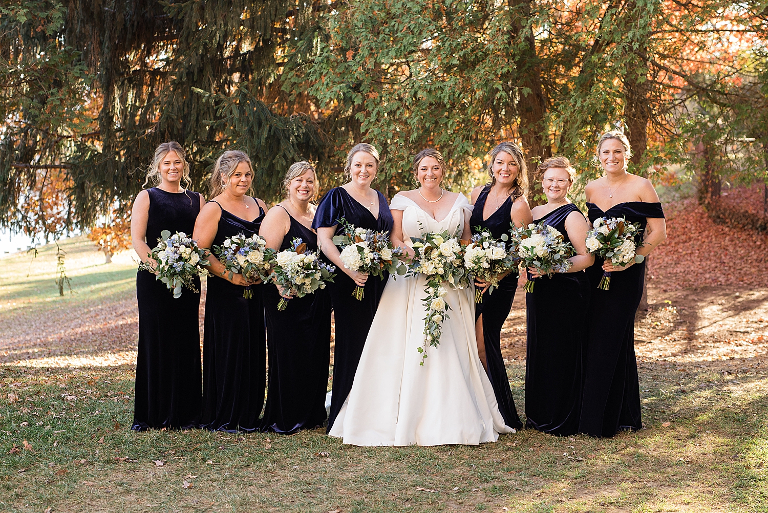 bride and bridesmaids in black dresses