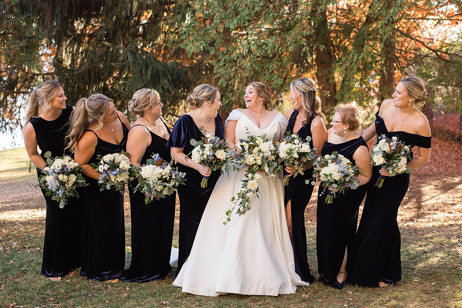 bride and bridesmaids in black dresses