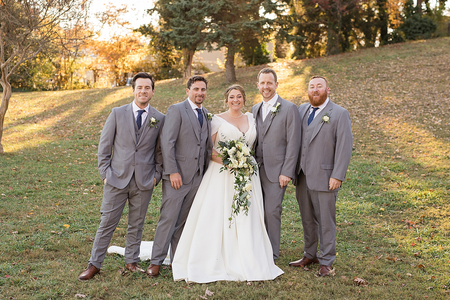 bride with groomsmen