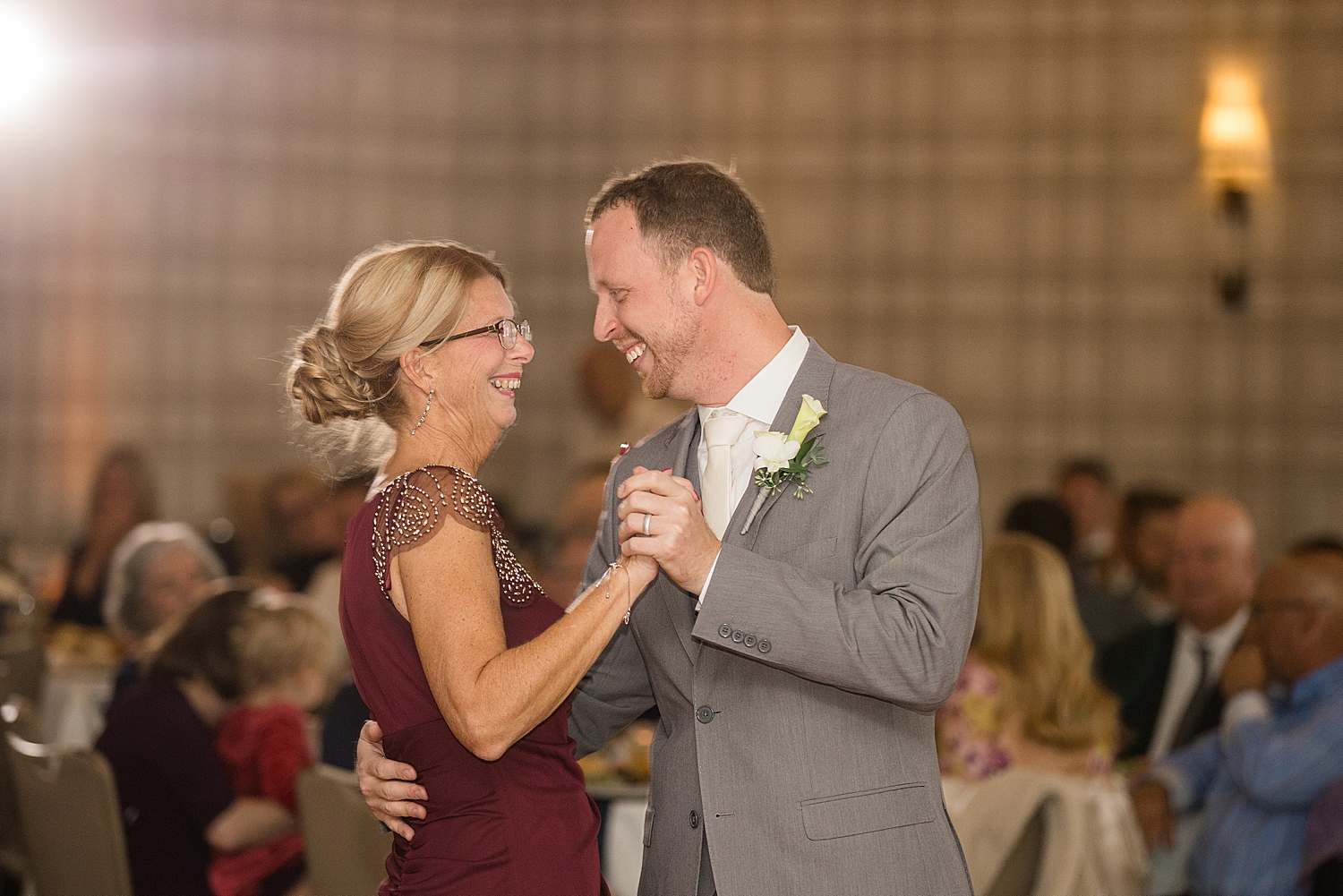 groom dancing with mom