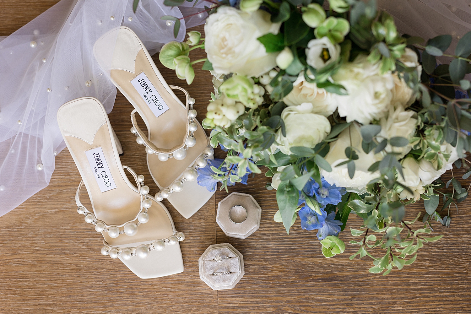 wedding flat lay bridal bouquet rings shoes