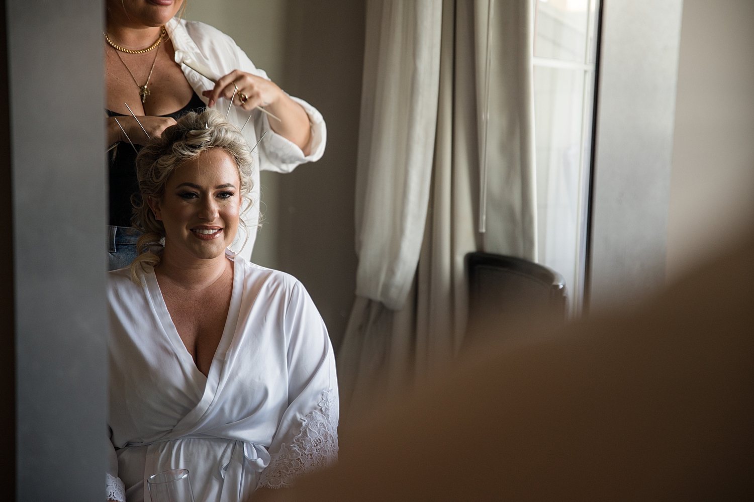 bride getting her hair done