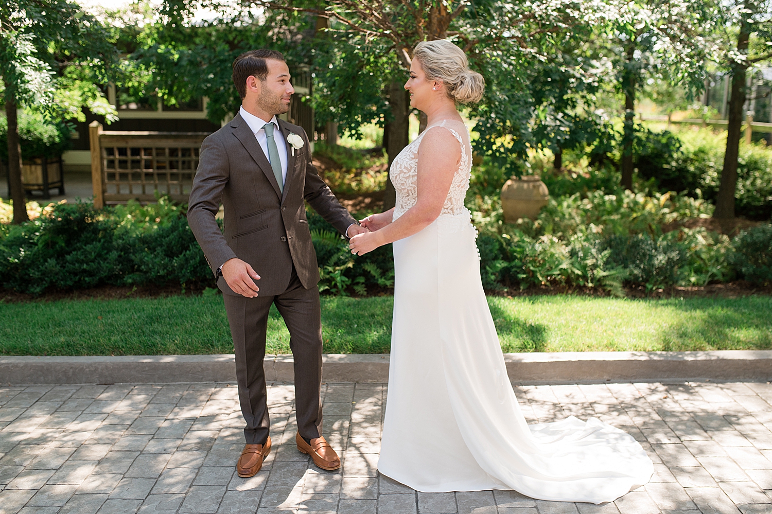 bride and groom first look chesapeake bay beach club inn courtyard