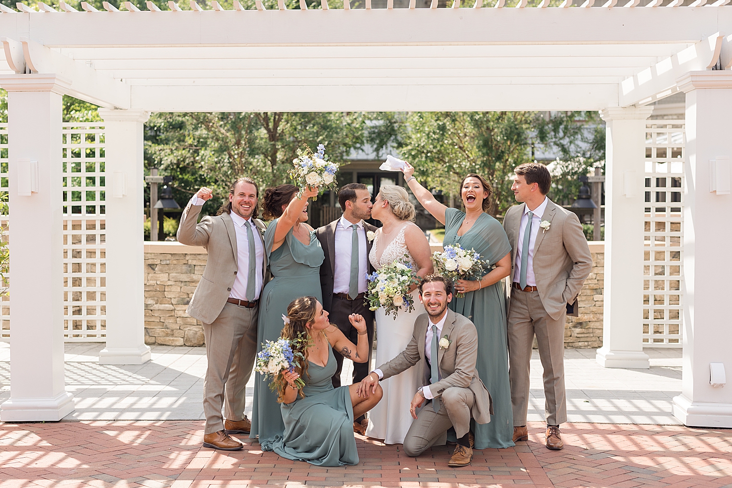 full wedding party cheering