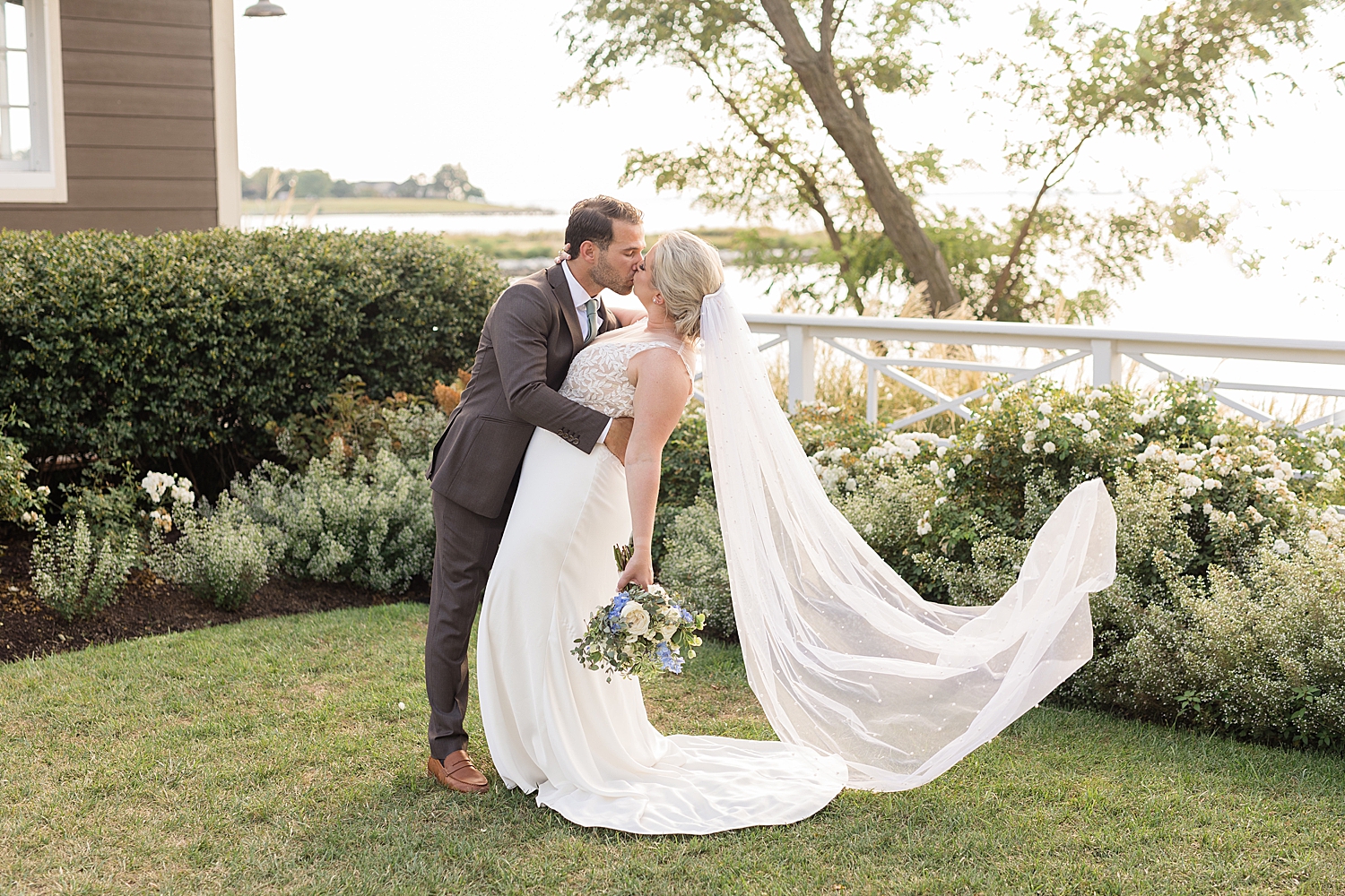 couple wedding portrait veil toss