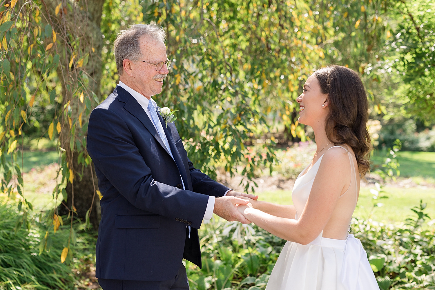 bride first look with dad