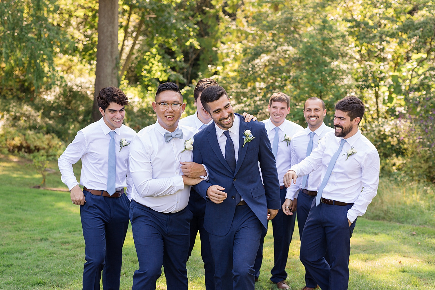 groom and groomsmen walking