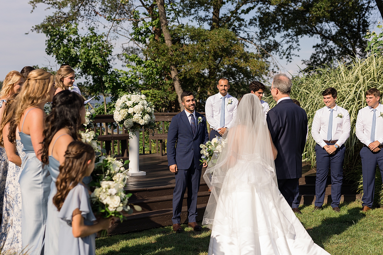 bride walking down the aisle to groom