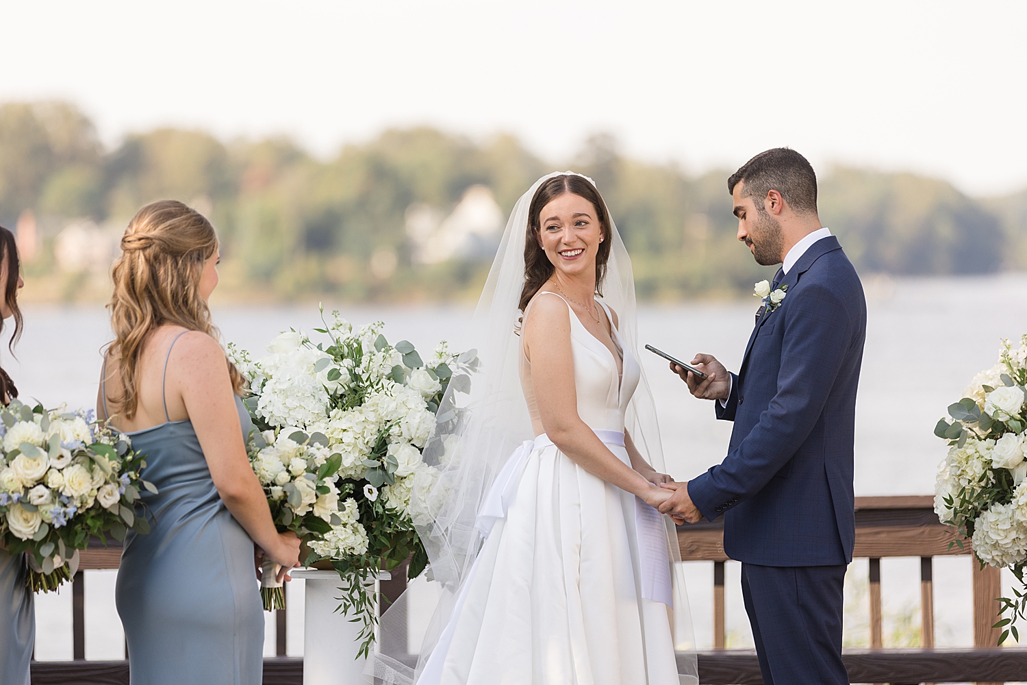 groom reading vows bride laughing