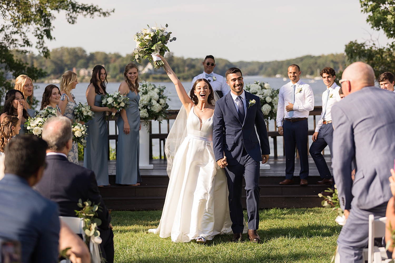 bride and groom cheer recessional