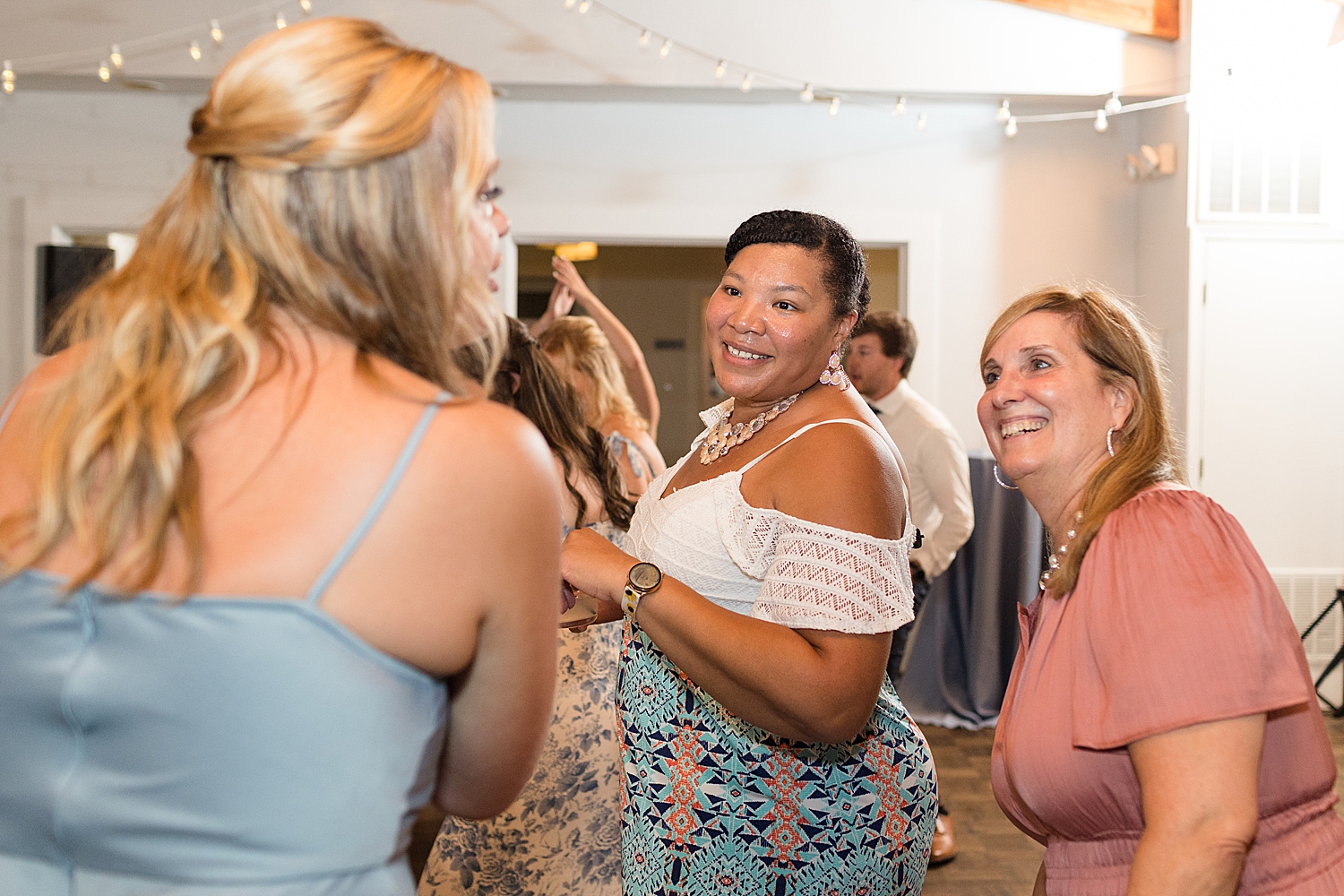 guests dancing during reception