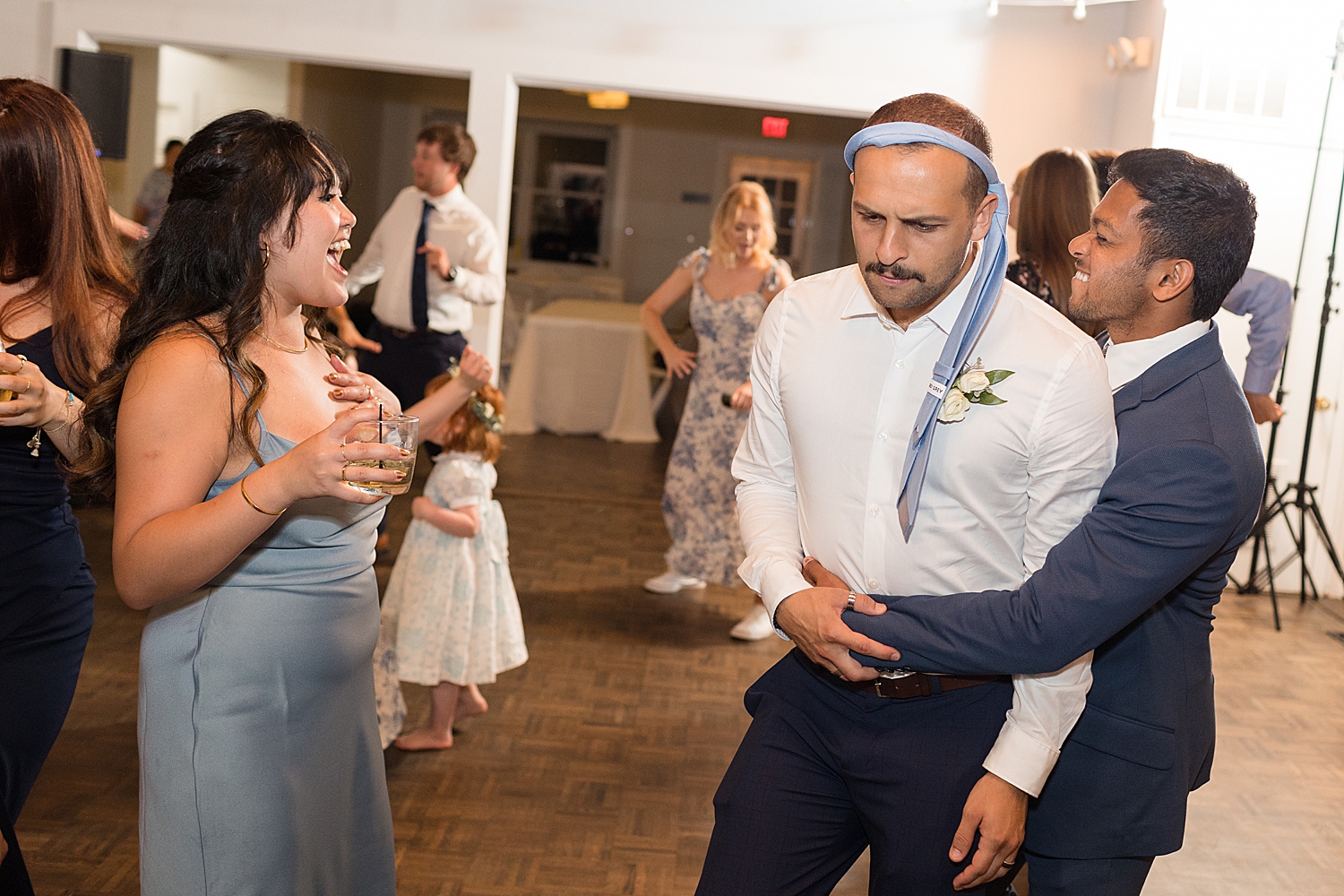 guests dancing during reception