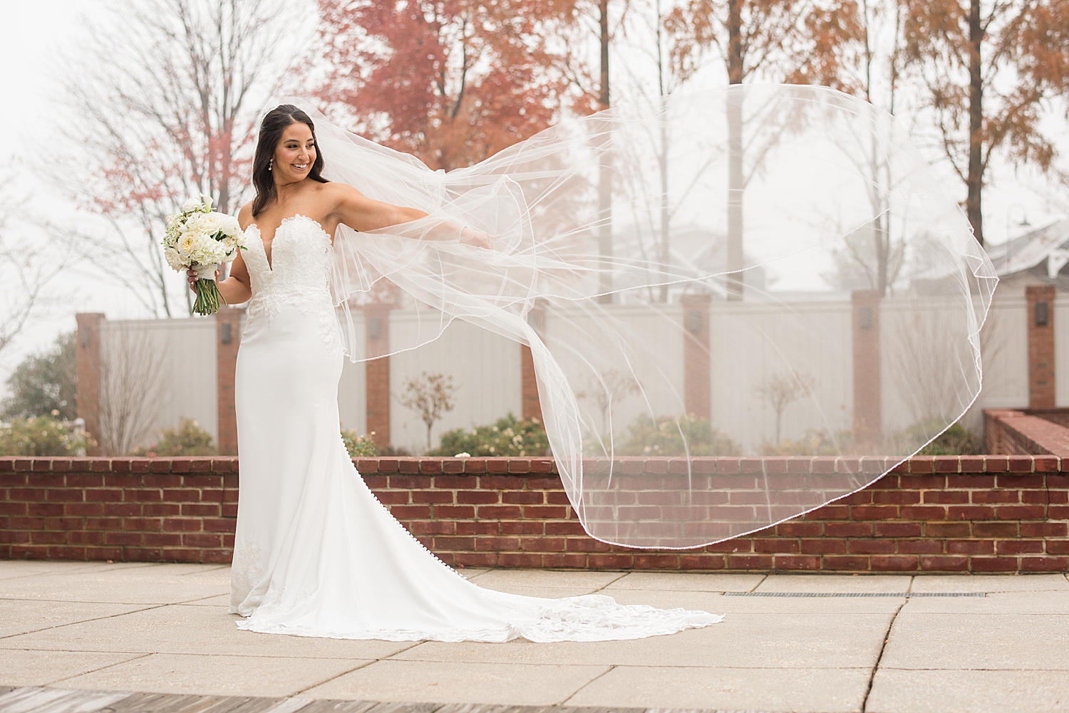 bridal portrait veil blowing