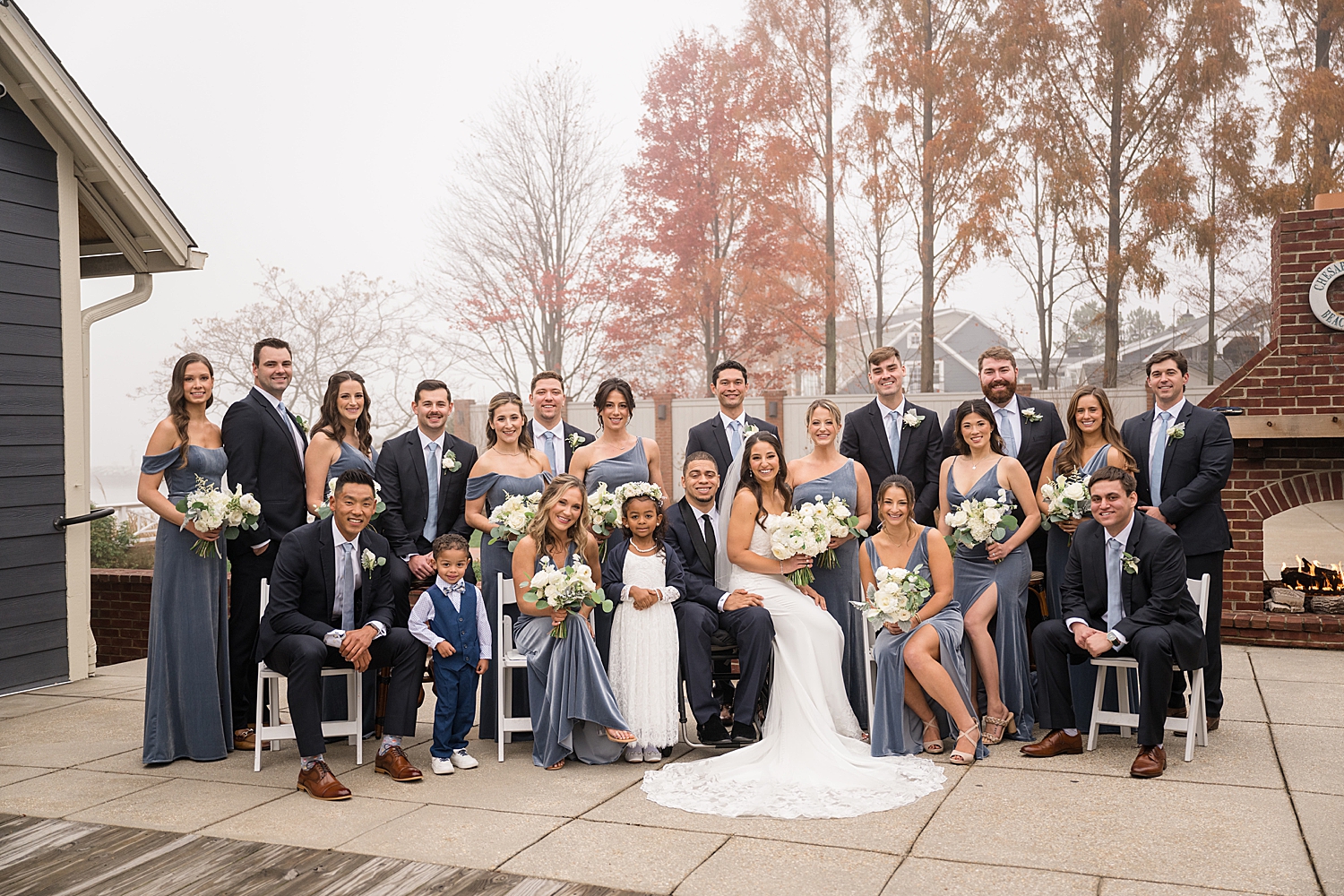 full wedding party portrait patio beach club