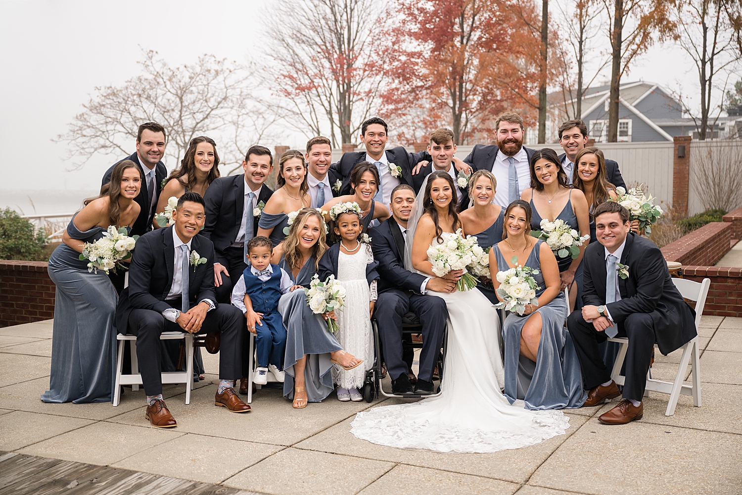 full wedding party portrait patio beach club