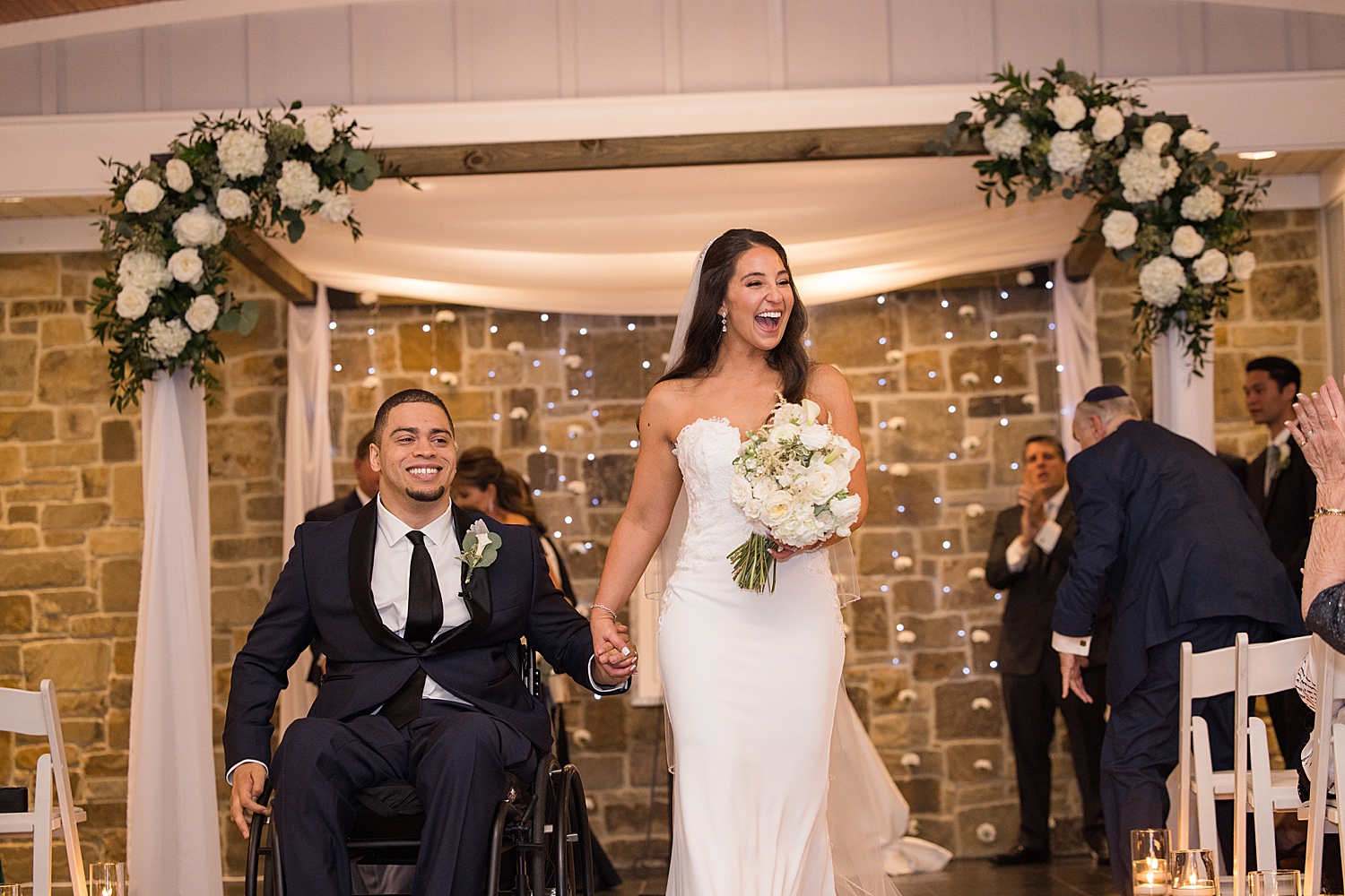 bride and groom recess cheering happy