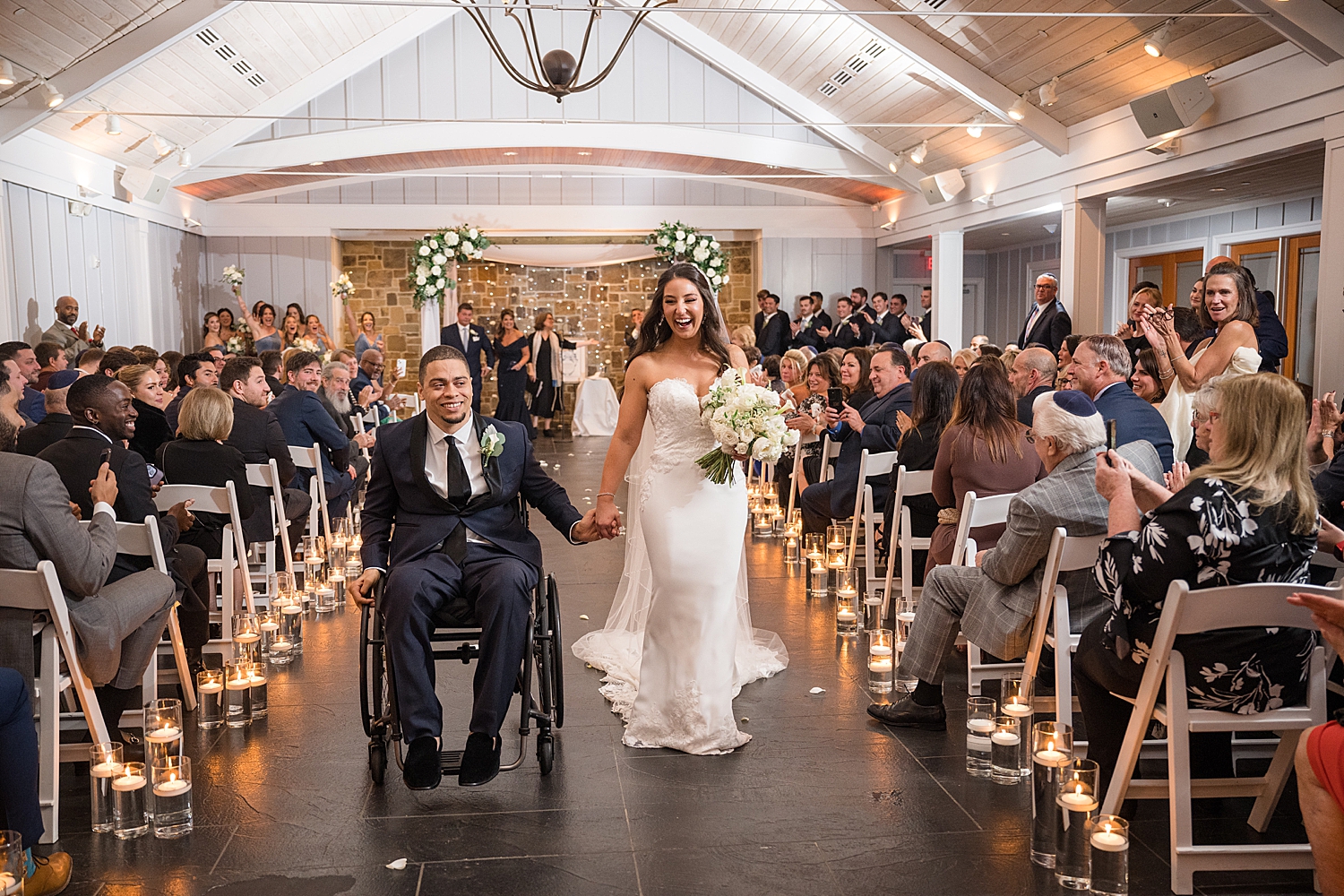 bride and groom recess cheering happy