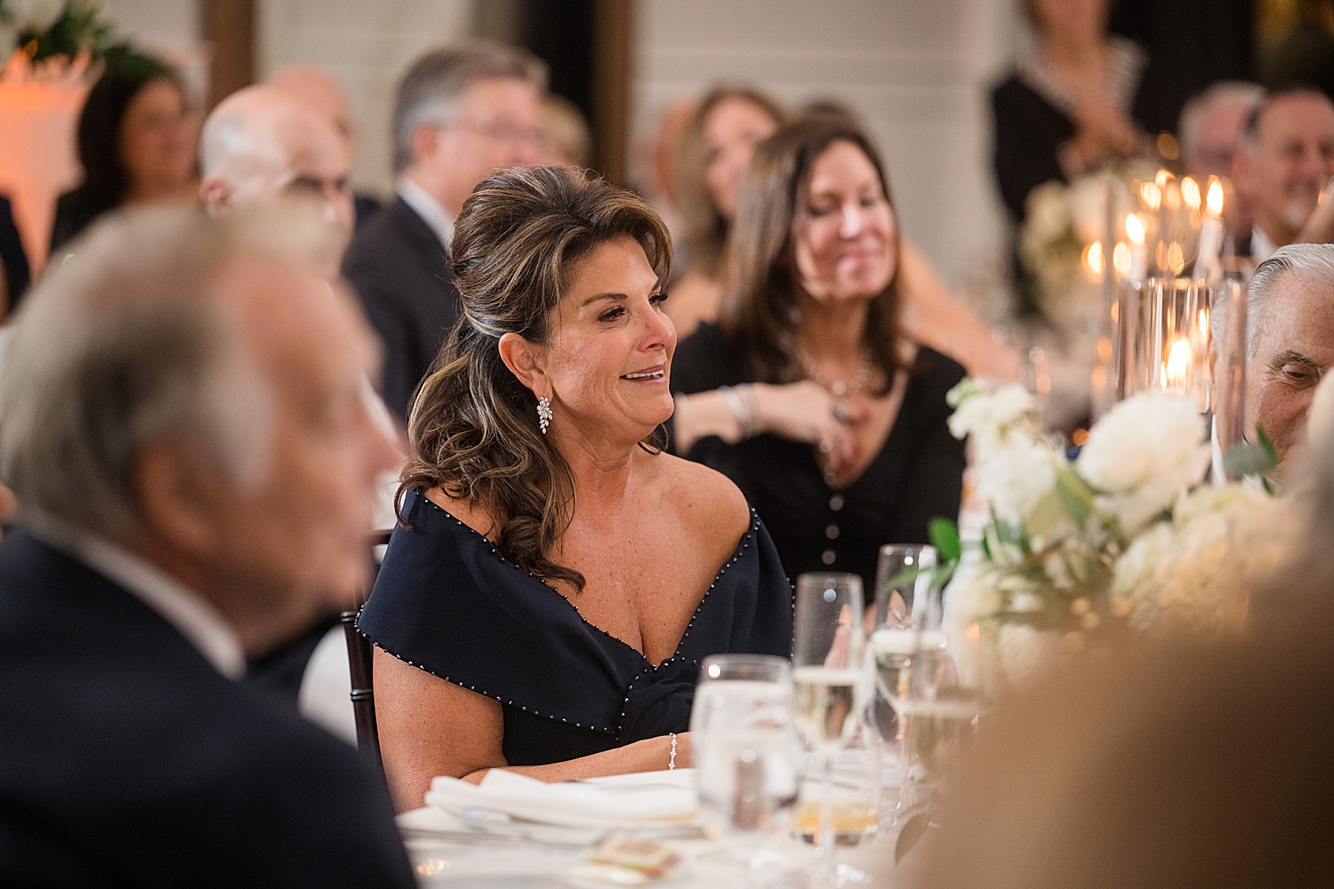 mom listening to wedding toast