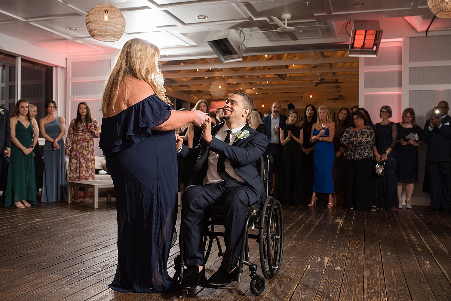 groom dances with mom