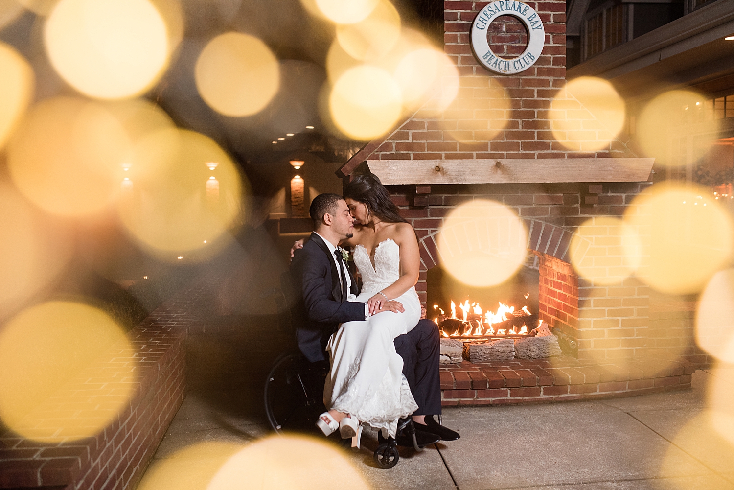 bride and groom night portrait with warm bokeh