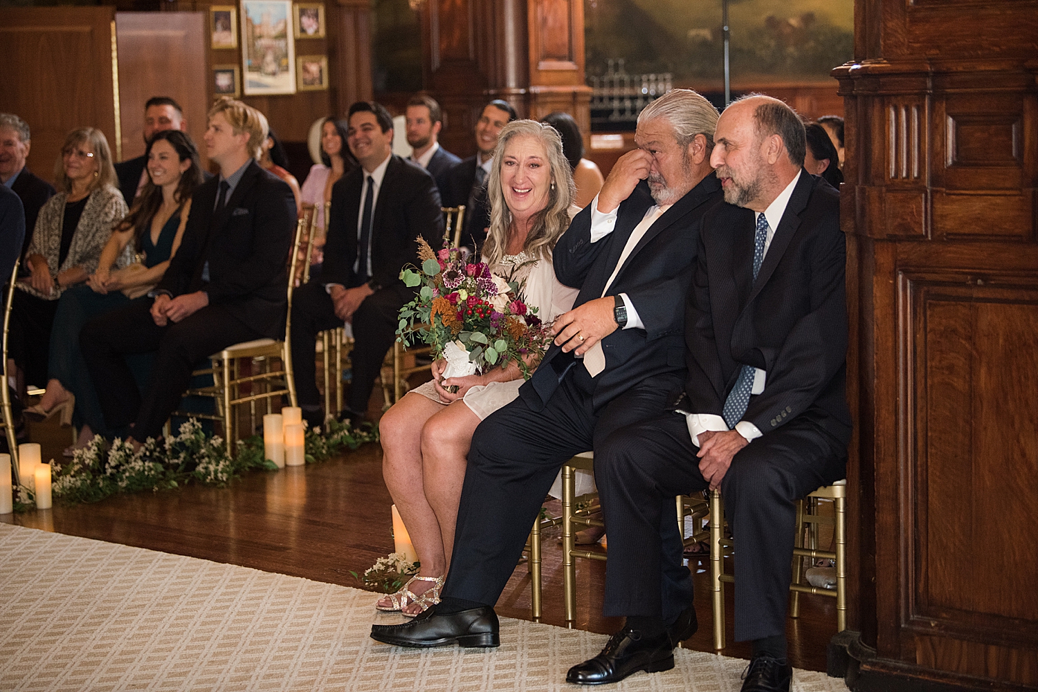 parents look on during microwedding ceremony