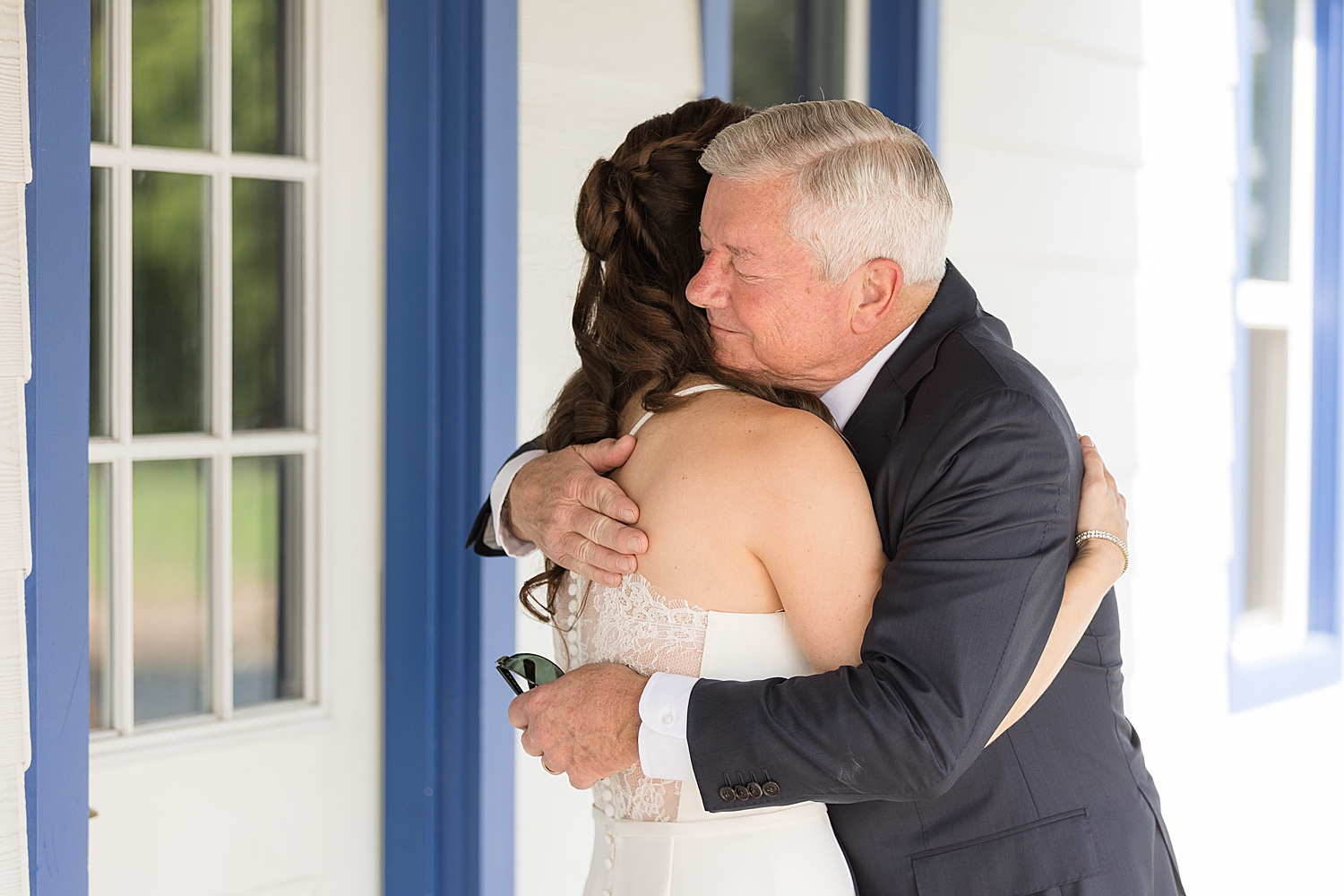 bride hugging dad