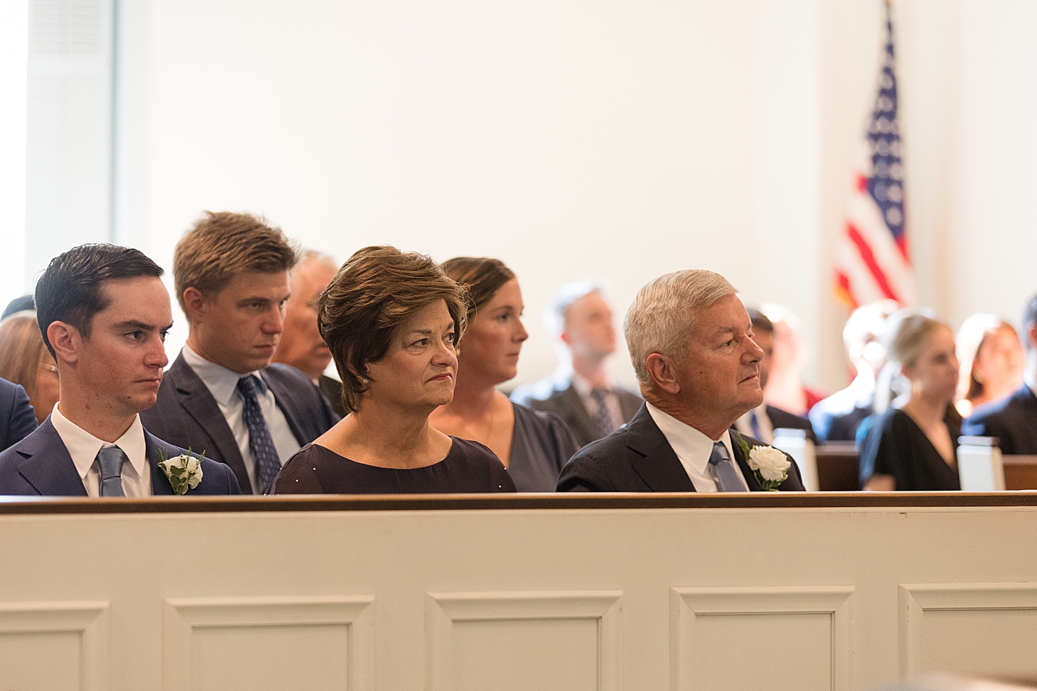 candid family during ceremony