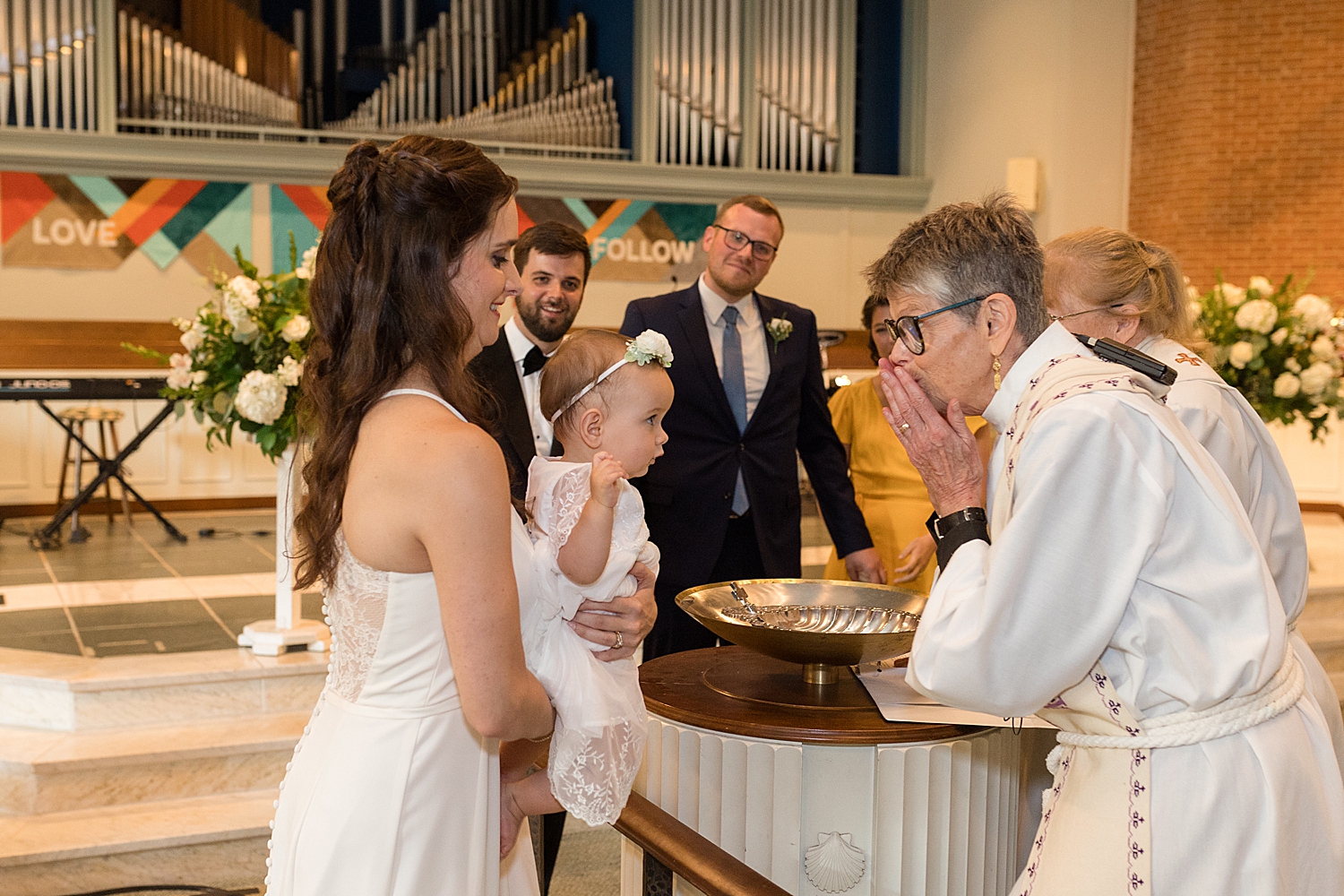 bride and groom wedding ceremony church baby baptized