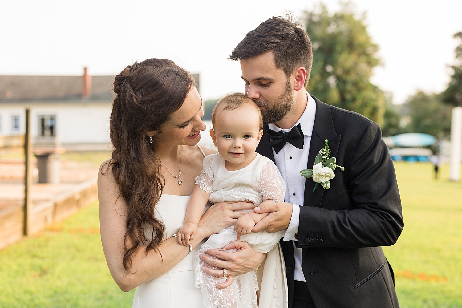 bride groom and baby