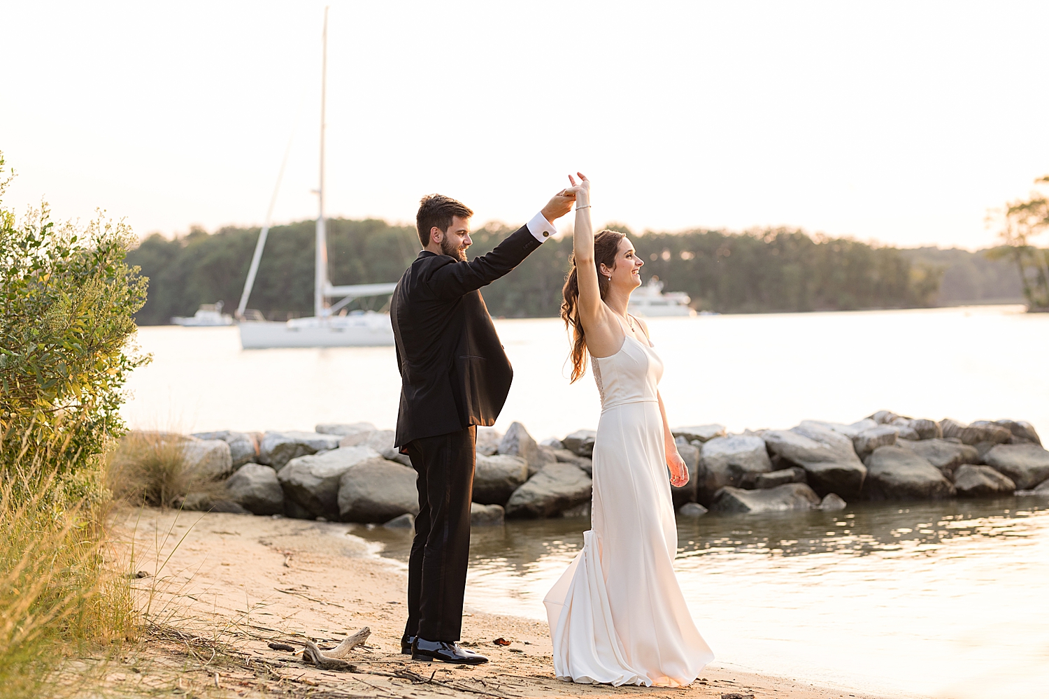 bride and groom on beach at sunset spin