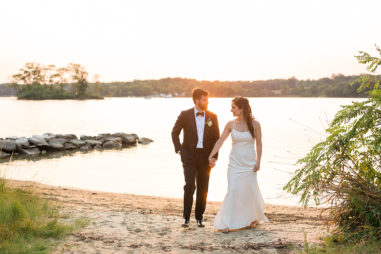 bride and groom portrait on beach sunset