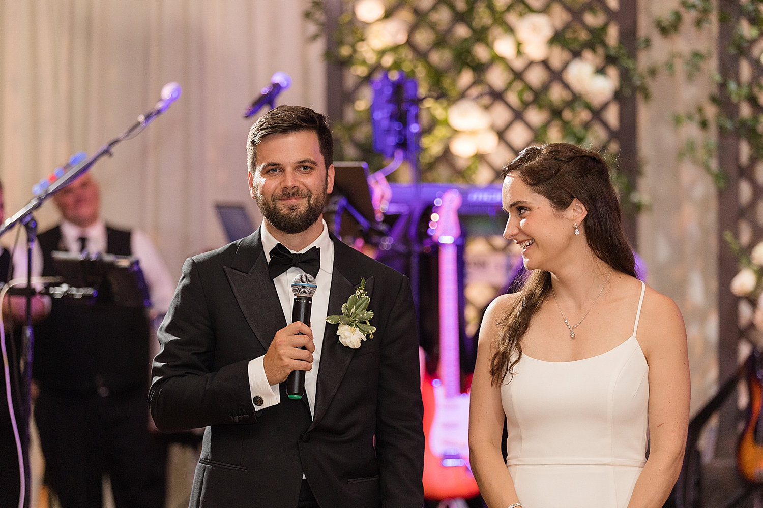 bride and groom give speech