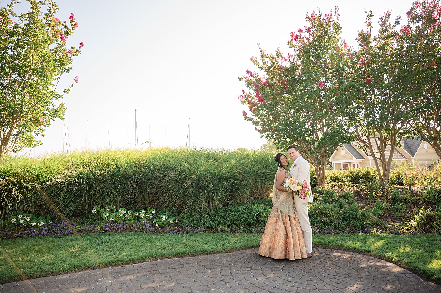 bride and groom embracing herrington on the bay