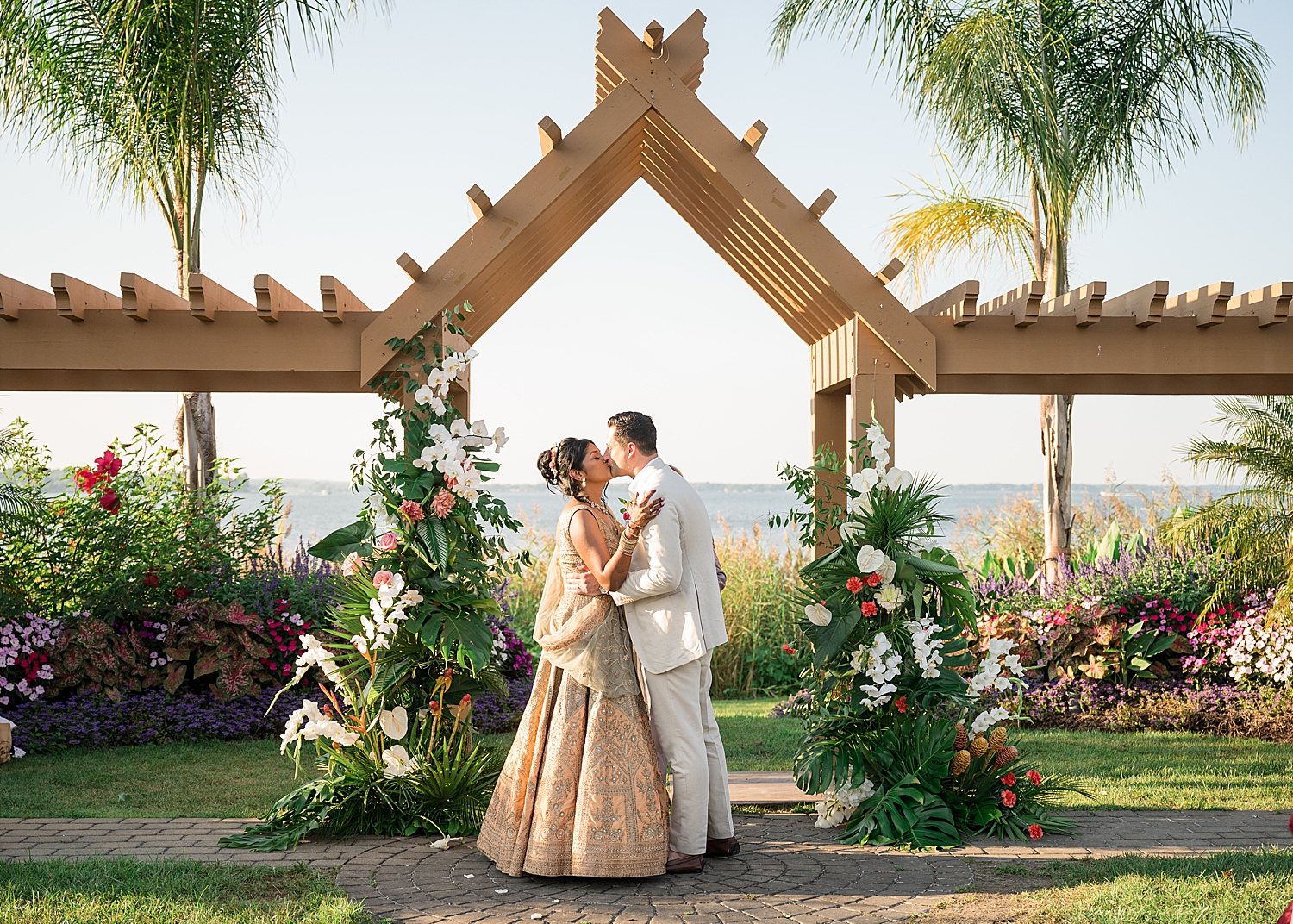 bride and groom first kiss