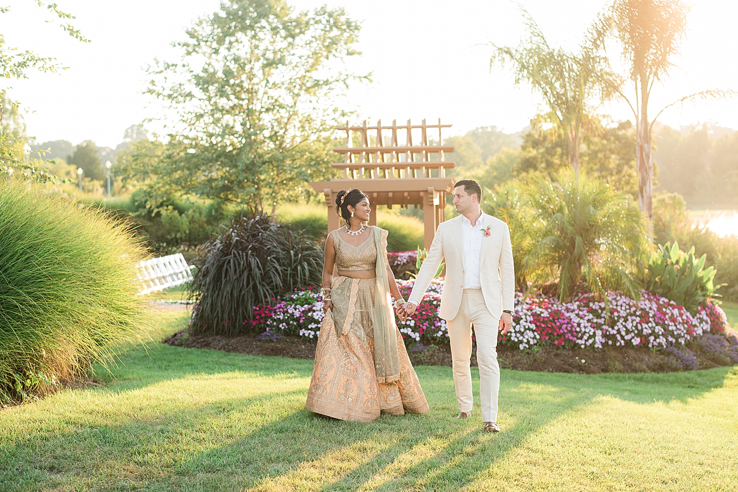 bride and groom smile at each other