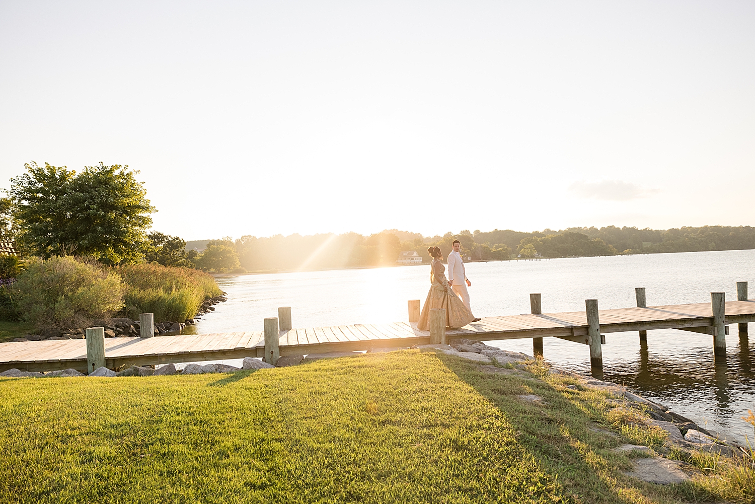 bride and groom on pier